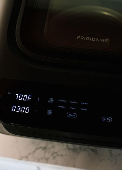 Frigidaire 700°F Indoor Electric Pizza Oven – 12” Stone Bake, Air Fry & Bake, Portable Countertop with Peel & Cutter