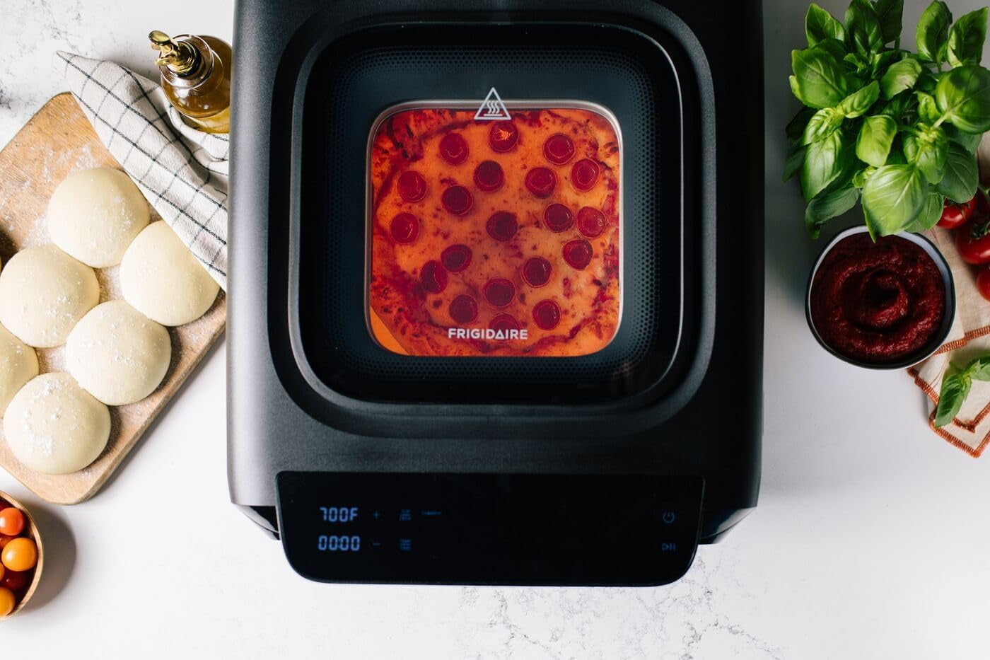 Frigidaire 700°F Indoor Electric Pizza Oven – 12” Stone Bake, Air Fry & Bake, Portable Countertop with Peel & Cutter